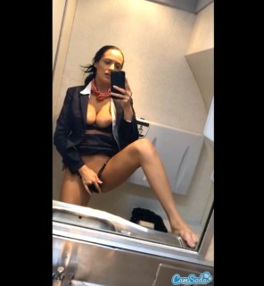 IMAGEFlight attendant showing her nice natural breasts [image]