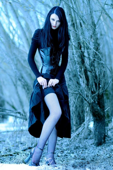 Gothic girl in fishnets