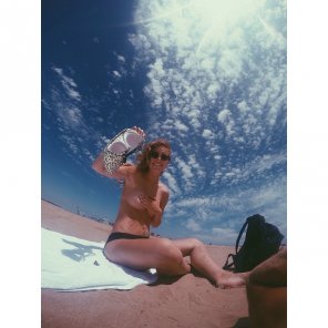 amateur photo Topless teen on the beach
