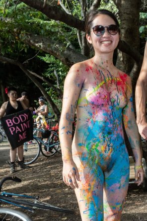 Body painted Asian happy to be naked in public
