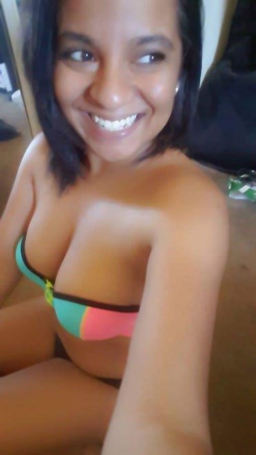 Smiling Latina nude