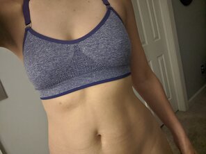 foto amateur stripping down a[f]ter last night's run and workout