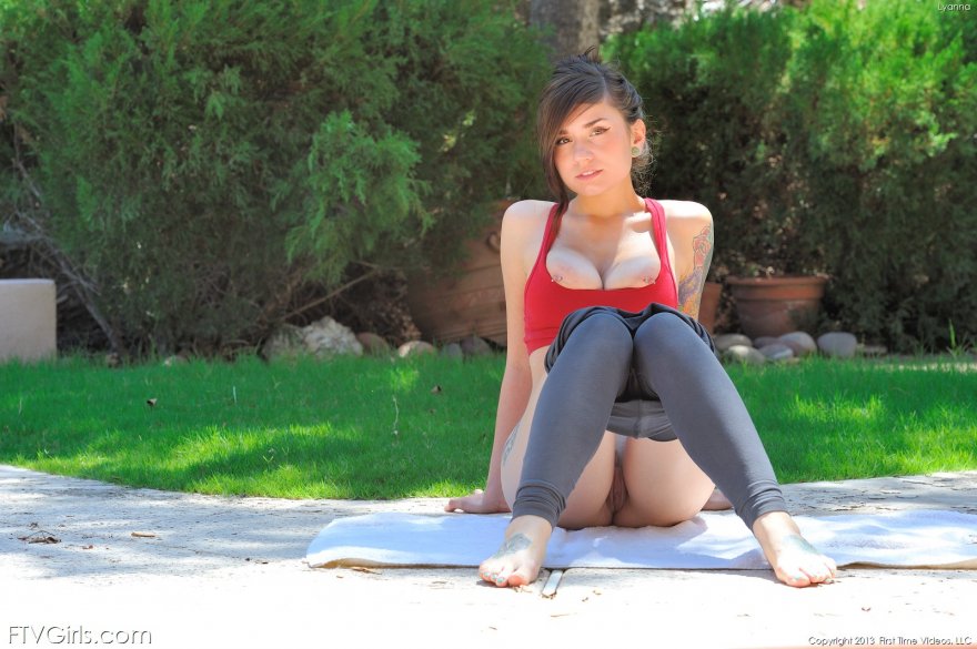 This yoga cutie is only half in her yoga pants