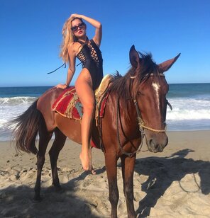 Riding on the beach