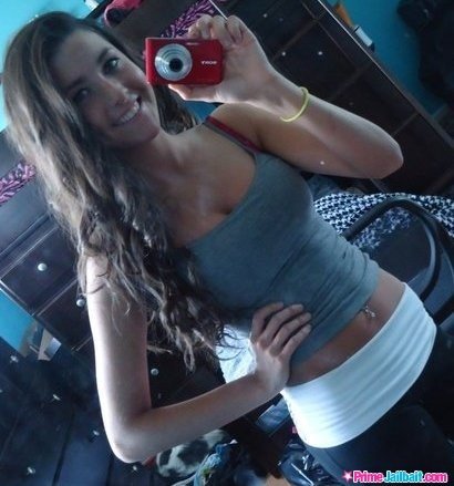 Selfie in a tank top and yoga pants