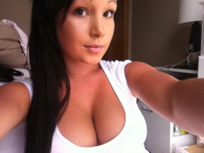 amateur photo Busty brunette babe in white top