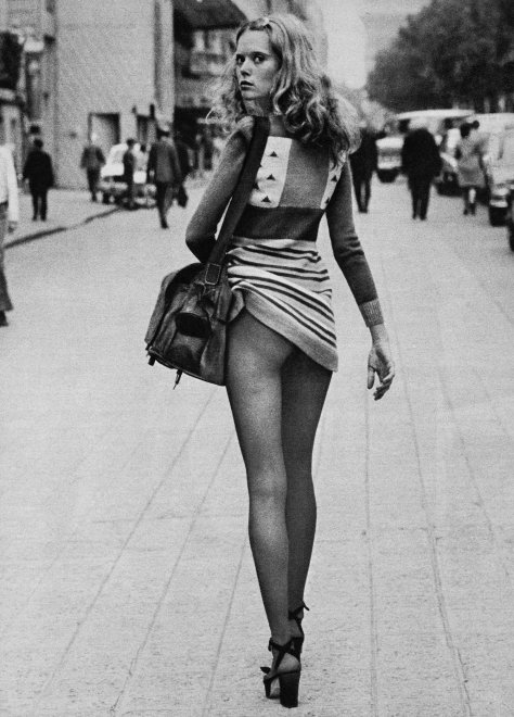 Lifting her dress on a public street in 1971