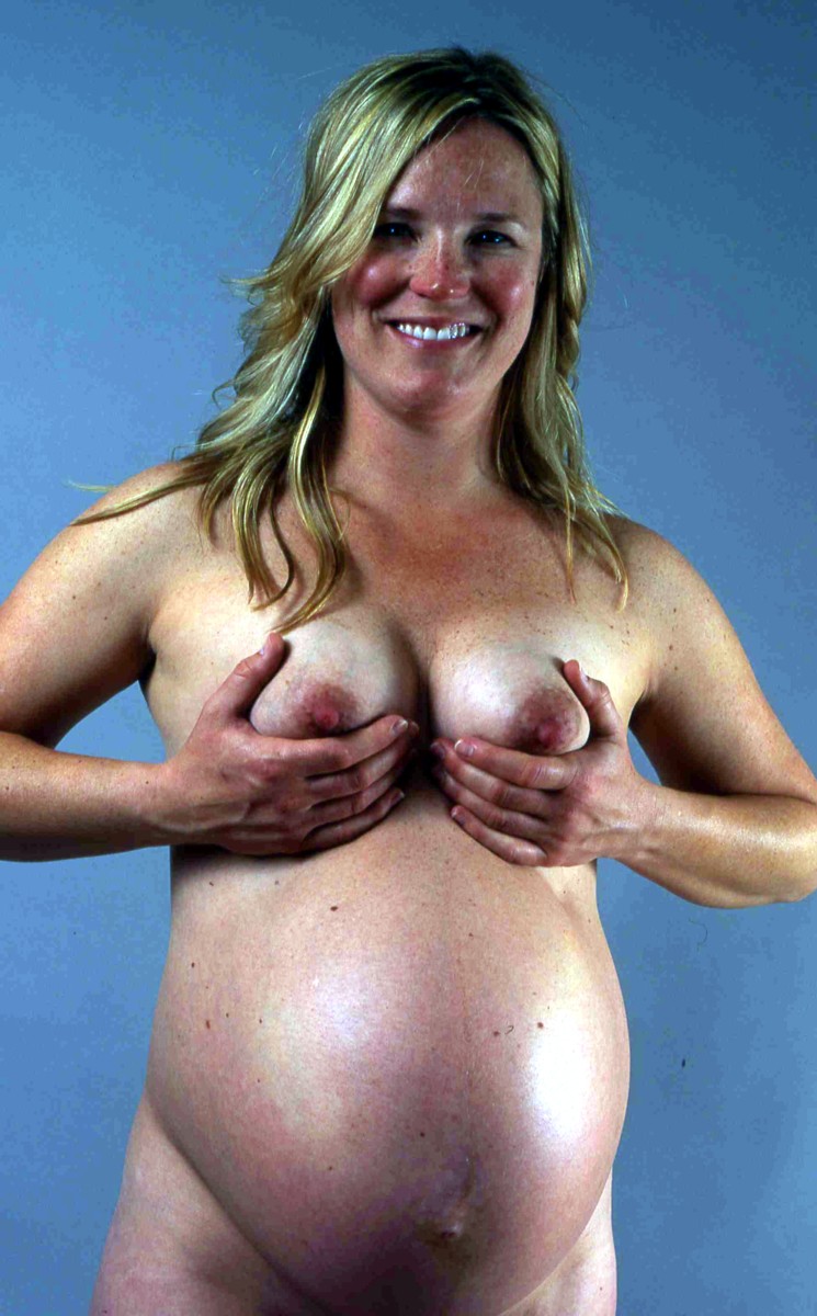 Smiling Holding Her Very Swollen Breasts Porn Photo Eporner