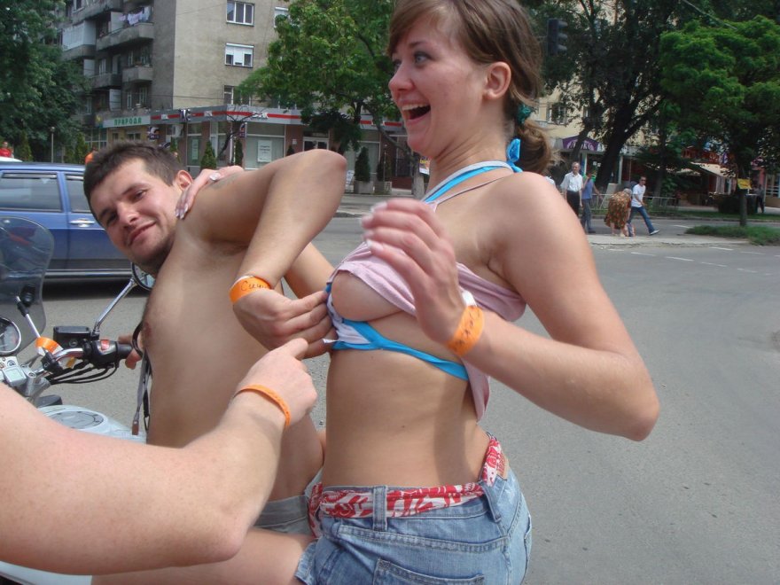 Women showing boobs in public