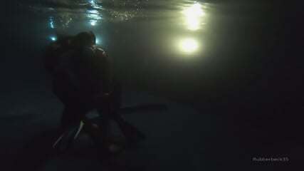 Scuba sex in pool at night