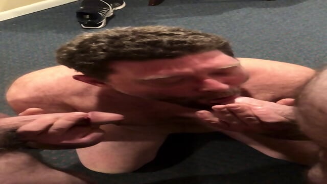 Amateur wife films husband suck two cocks in a motel