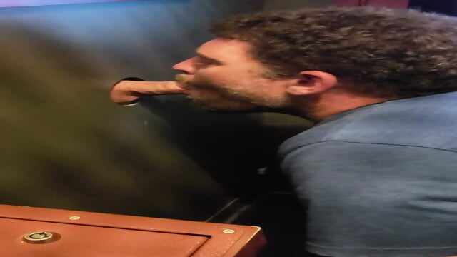 Wife watches husband suck a thick cock at the gloryhole