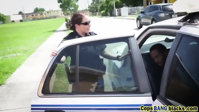 Busty cops riding long black schlong outdoors