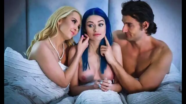 A guy and his two girlfriends on the bed to have a group sex
