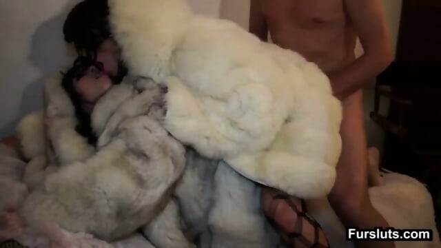 Two Brunettes Fucked In White Fur Coat