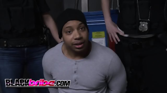 Black stud gets cock pleased by two busty cops
