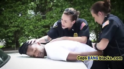Tattooed cop pleased by black guy