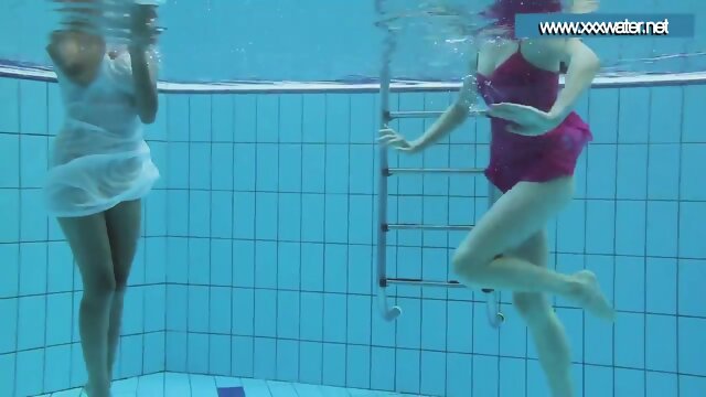 Hotly dressed teens in the pool