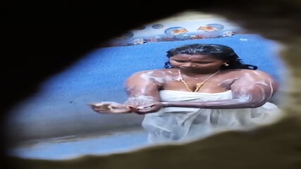 Tamil Aunty Secretly Captured Through Wall Hole While Bathing