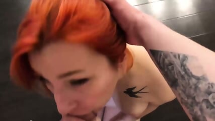Tattooed redhead enjoys having my cock explore her sexy mouth