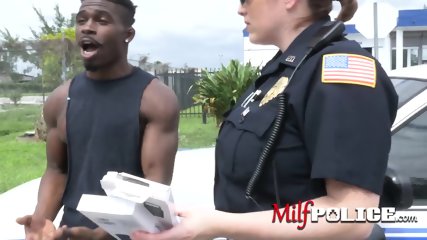Suspect Gets His Cock Sucked And Ridden By Horny Milf Cops