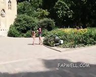 Two Babes Kneel To Suck Dick Outdoors