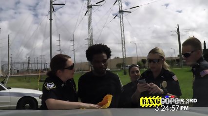 Busty Cops Take This Young Black Dude To A Hidden Roof Just To Bang His Cock With Their Fat Ass