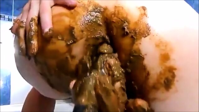 Scat woman shitting masturbating and squirting