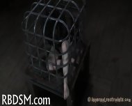 Caged Babe Forced To Give Blowjob