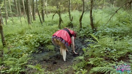 Red Riding Hood In Forest Mud