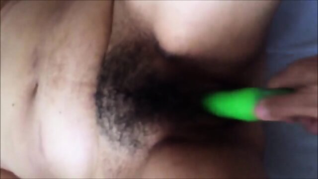 I use her big dildo to fuck her hairy pussy