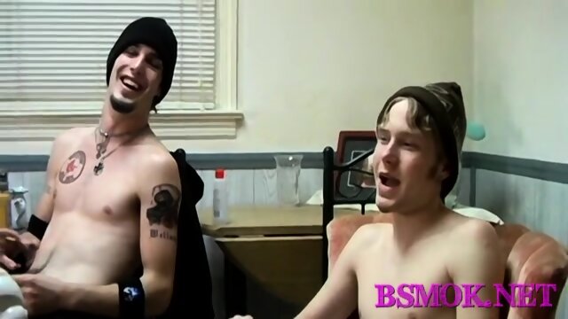 Gay hunk smokes and jerks off