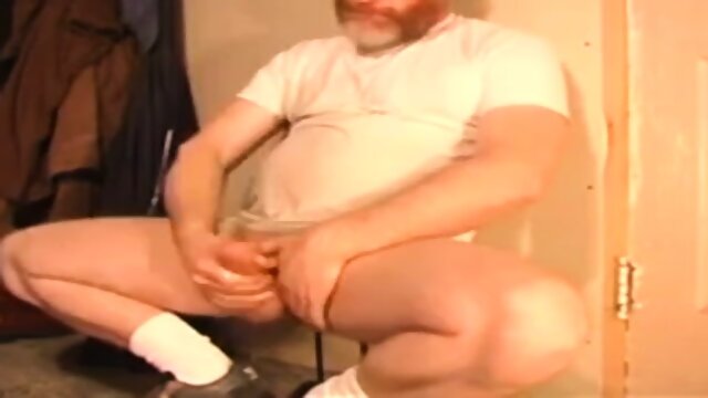 Bearded gay jerks off