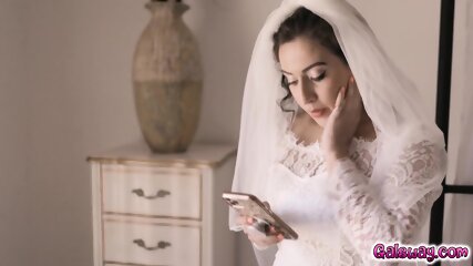 April and Whitney bangs with their wedding veils on so that they never actually see each other