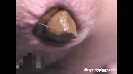 This Woman Is Shitting A Huge Turd Closeup