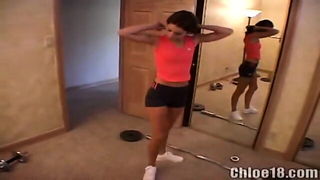 Petite teen masturbates in solo session