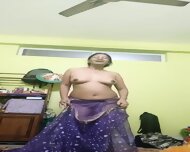 Desi-aunty-dancing-topless-after-stripping-saree