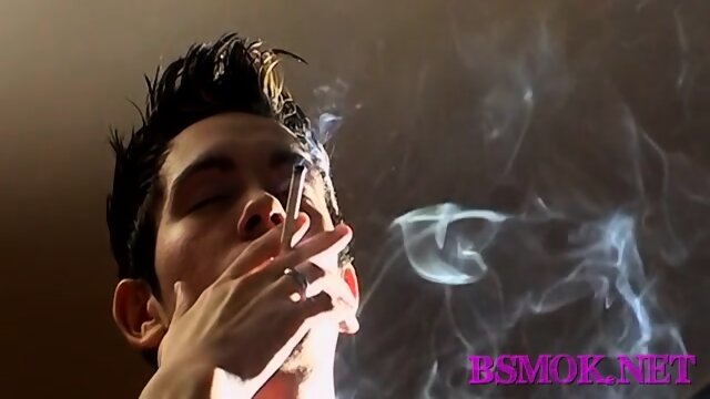 Gay jacks off and smokes
