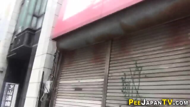 Asian Pees Outside While Squatting - Screenshot 1 of 15 - Piss