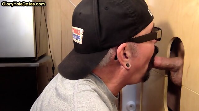 Gloryhole stud loves sucking stiff dick while stroking it