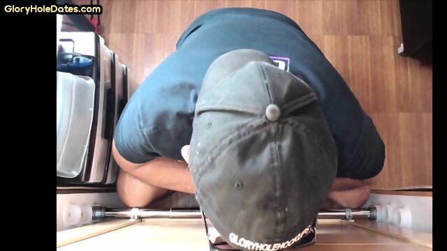 Mature gloryhole amateur DILF sucks BFs cock through hole